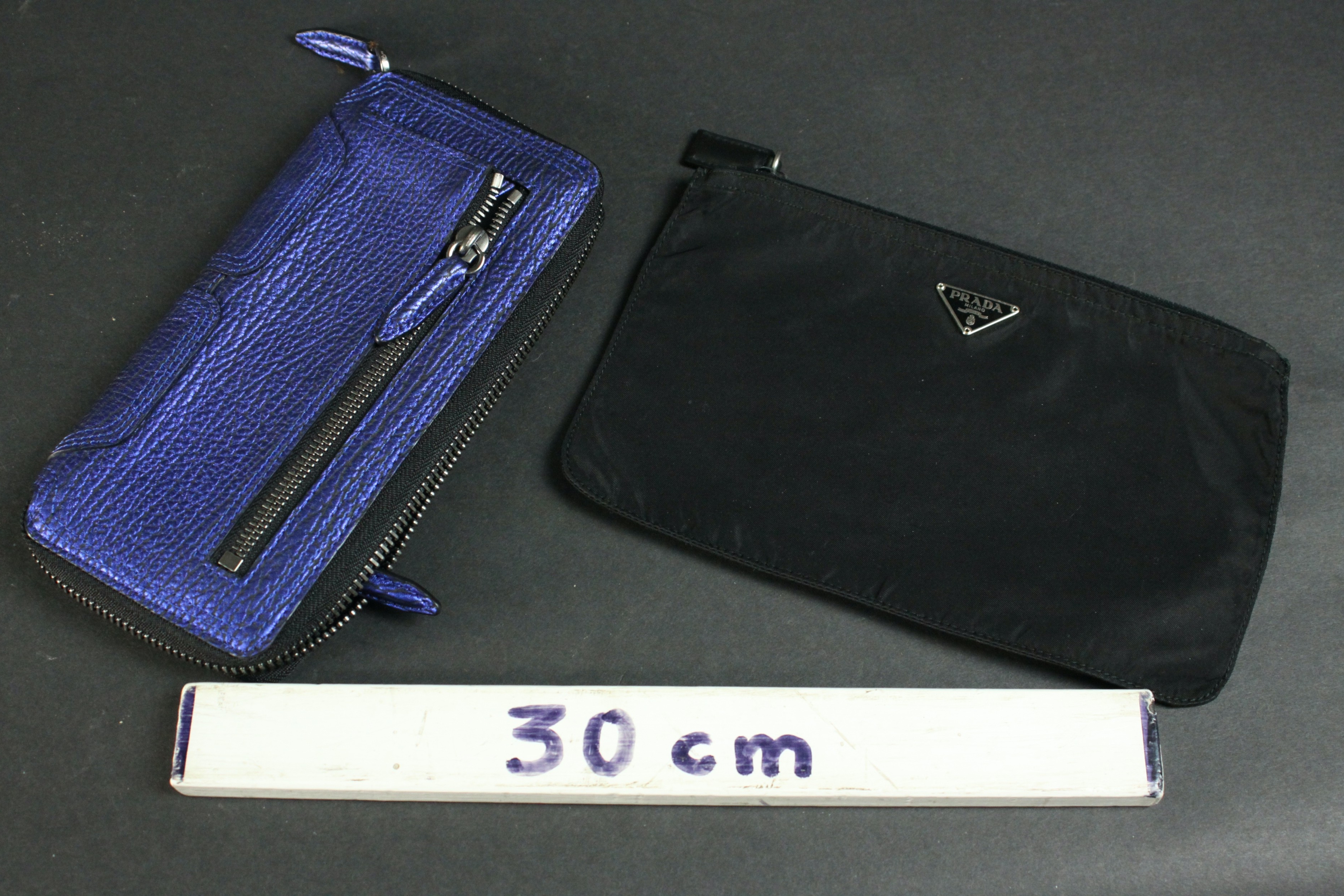 A vintage black silk Prada zip purse along with a Philip Lim metallic blue leather clutch bag. H. - Image 2 of 6
