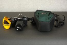 A Nikon 35mm N80 SLR film camera with case. H.18 W.17 D.12cm