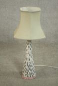 A late 20th century mosaic table lamp, of tapering form with a shade. H.67 Dia.14cm.