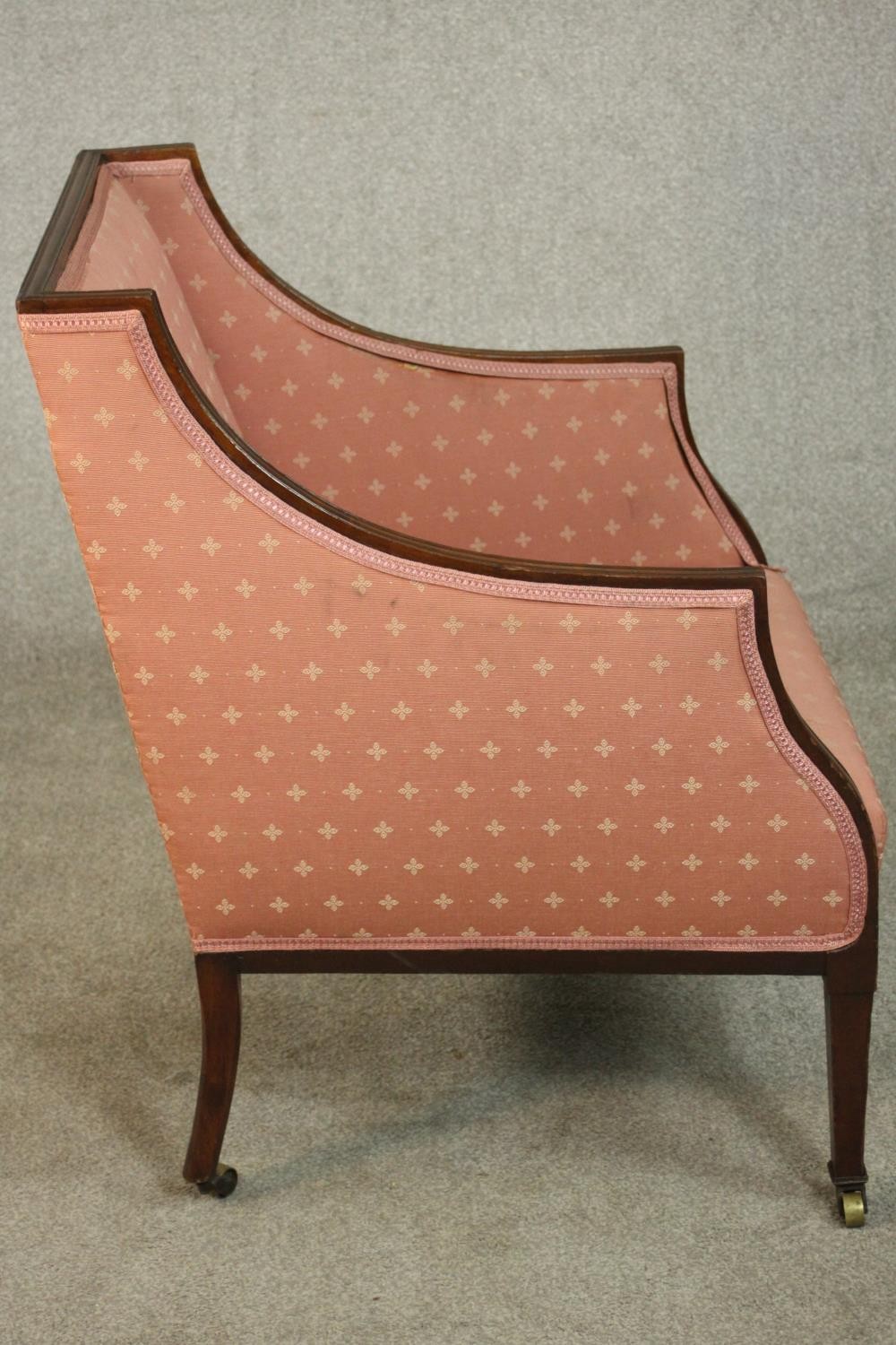 An Edwardian Adam style mahogany armchair upholstered in pink fabric, on square section tapering - Image 3 of 5