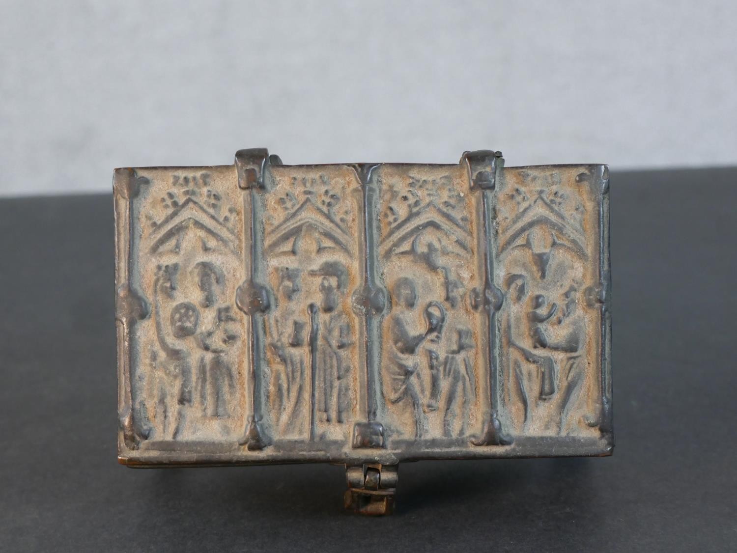 A bronze casket with relief religious figural design on four feet along with a silver plated Roman - Image 6 of 7