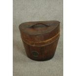 A Victorian brown leather hat box. H.33 W.35 D.34cm.
