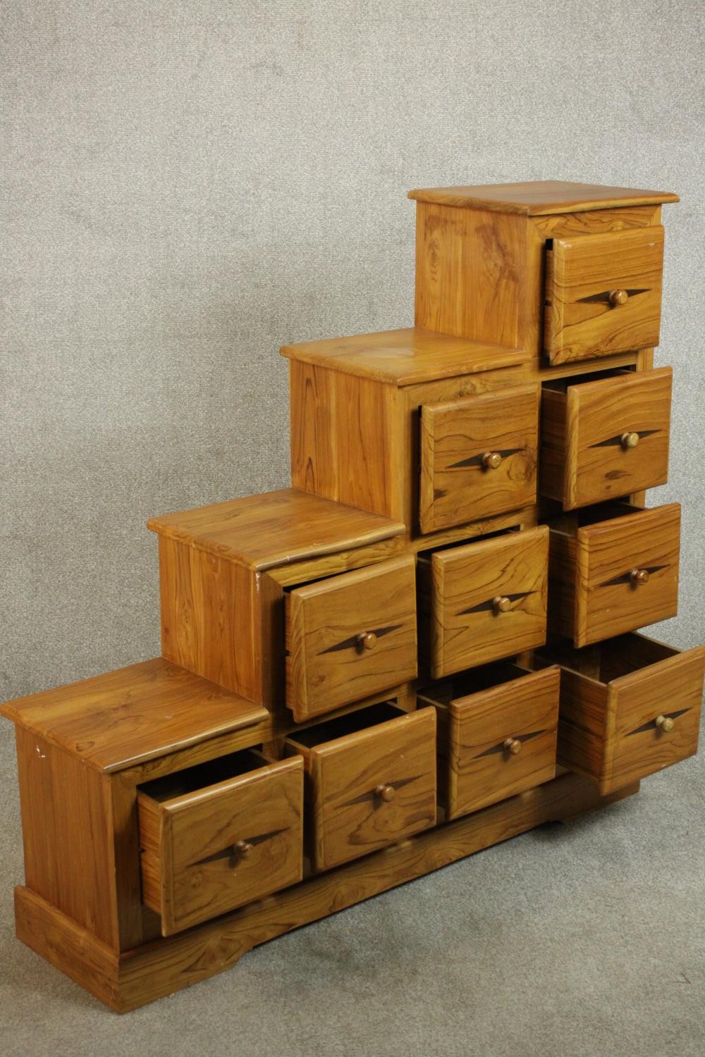 A contemporary pine stepped chest in the style of a Japanese kaidan tansu, with an arrangement of - Image 5 of 9