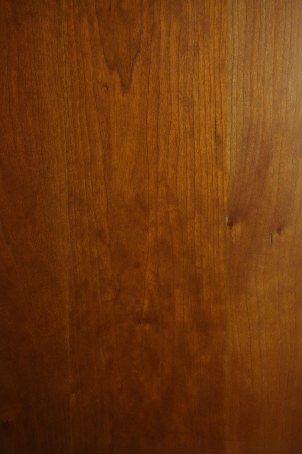 A late 20th century cherrywood wardrobe, with a pair of panelled doors opening to reveal hanging - Image 13 of 13