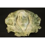 A concrete wall planter in the form of a an Art Nouveau female head with flowers in her hair. H.20