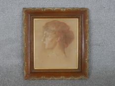 A framed and glazed pastel portrait of a female, unsigned. H.49 W.45cm