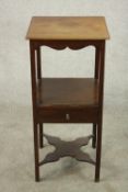 A 19th century mahogany washstand table, the square top with a moulded edge over an undertier with a