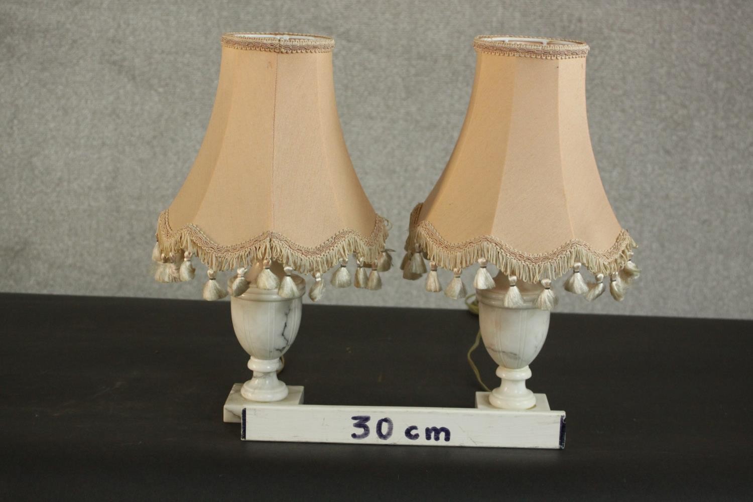 A pair of urn form marble table lamps, on square bases with pink shades. H.38 Dia.20cm. (each) - Image 2 of 5
