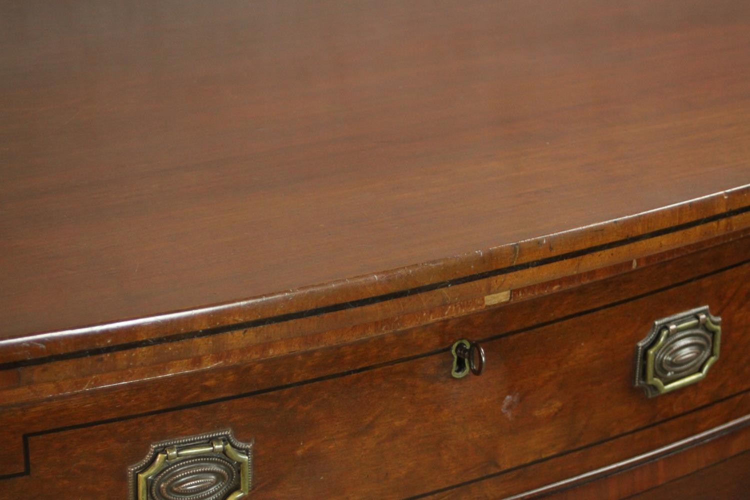 A Regency mahogany bow front sideboard, with a central drawer flanked by two deep drawers on - Image 12 of 13