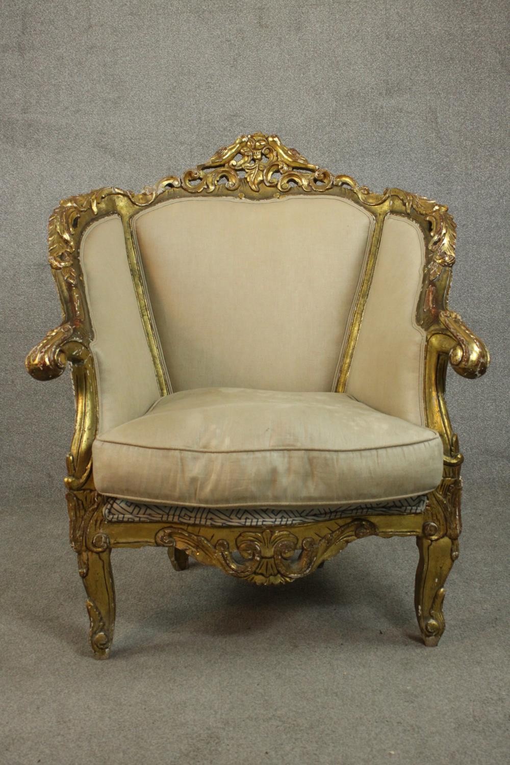 A pair of Louis XV style carved giltwood armchairs, 20th century, upholstered in beige fabric, - Image 7 of 10
