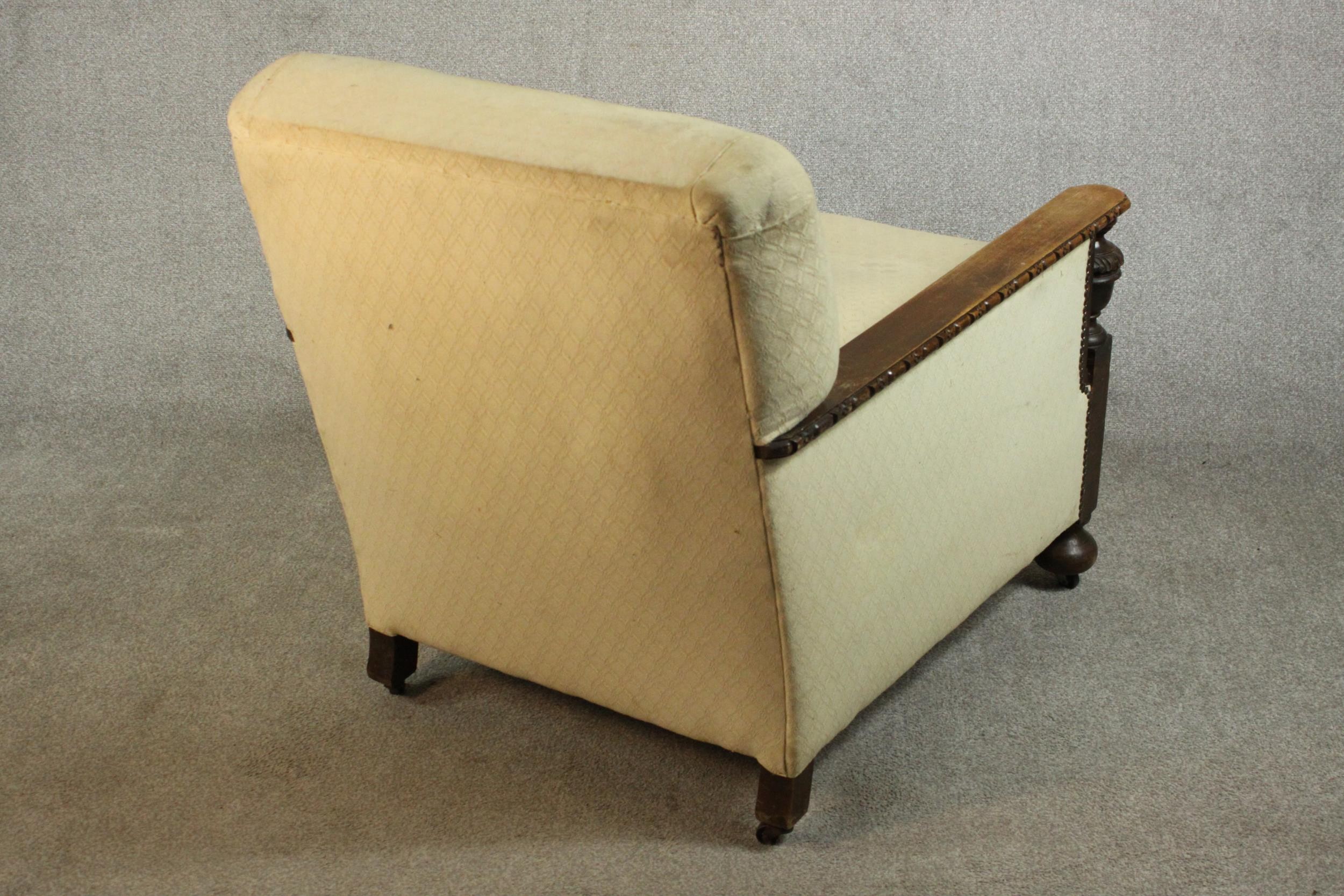 A pair of early 20th century oak armchairs, upholstered in cream fabric, with carved cup and cover - Image 7 of 10