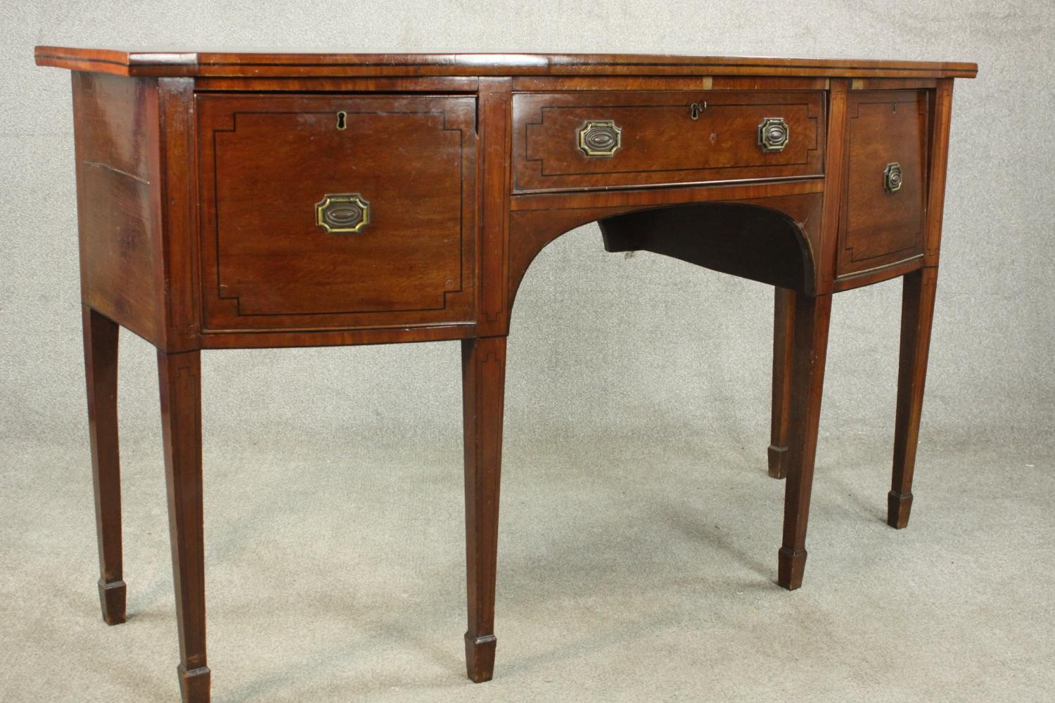 A Regency mahogany bow front sideboard, with a central drawer flanked by two deep drawers on - Image 11 of 13