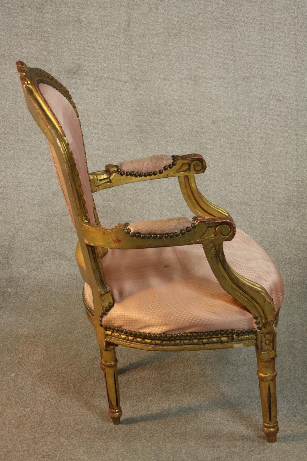 A pair of Louis XVI style giltwood fauteuil armchairs, upholstered in pink fabric to the back, - Image 5 of 12