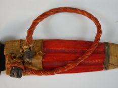 Two African Sudan Coutea Tebu daggers in leather sheaths. L.30cm (largest)