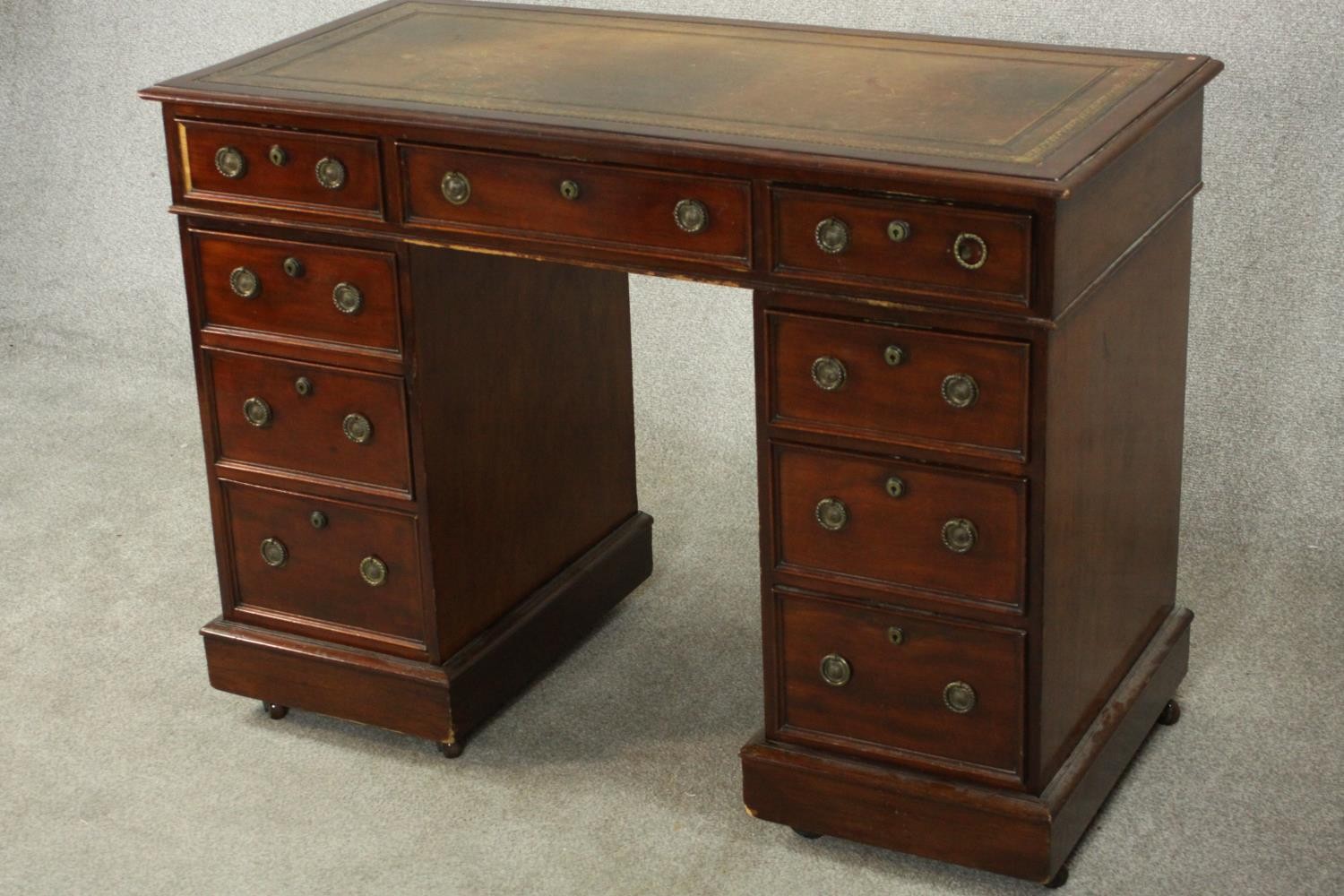 A small C.1900 mahogany pedestal desk, with a tooled green leather writing insert over an - Image 3 of 9