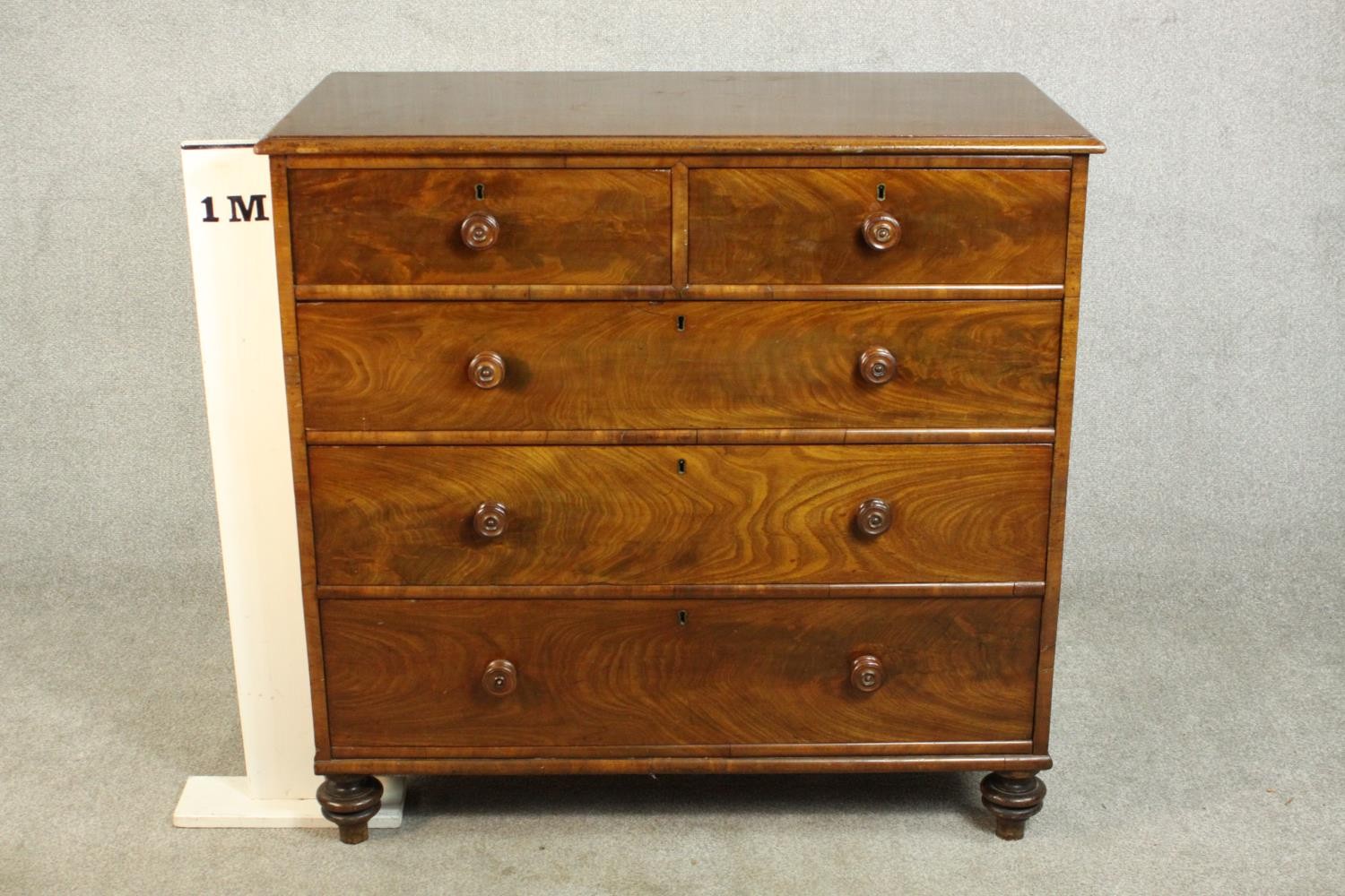 A 19th century flame mahogany chest of two short over three long drawers with knob handles, on - Image 2 of 8