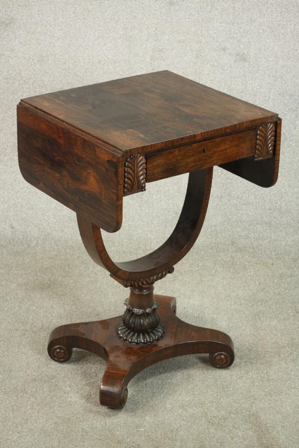 A William IV rosewood drop leaf work table, with a single drawer flanked by applied palm leaves, - Image 3 of 11