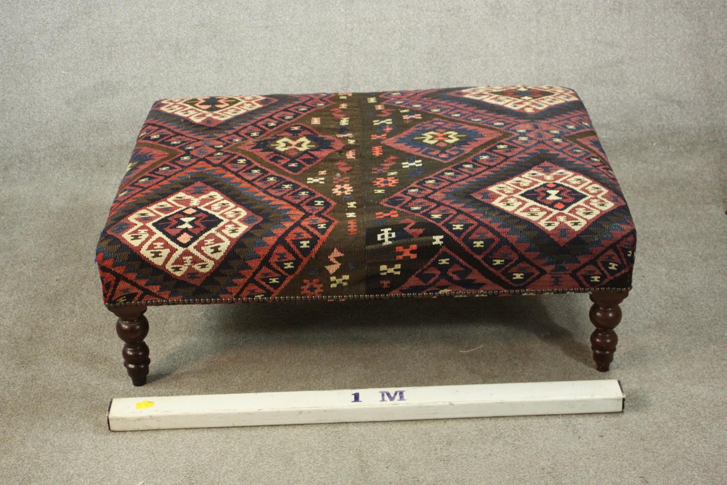 A contemporary footstool, of rectangular form upholstered in kilim fabric, on turned legs. H.33 W. - Image 2 of 6