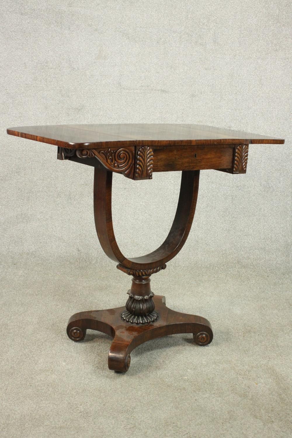 A William IV rosewood drop leaf work table, with a single drawer flanked by applied palm leaves, - Image 11 of 11