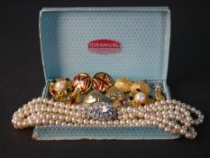 A collection of mixed costume jewellery, including a faux pearl multi-strand necklace with paste