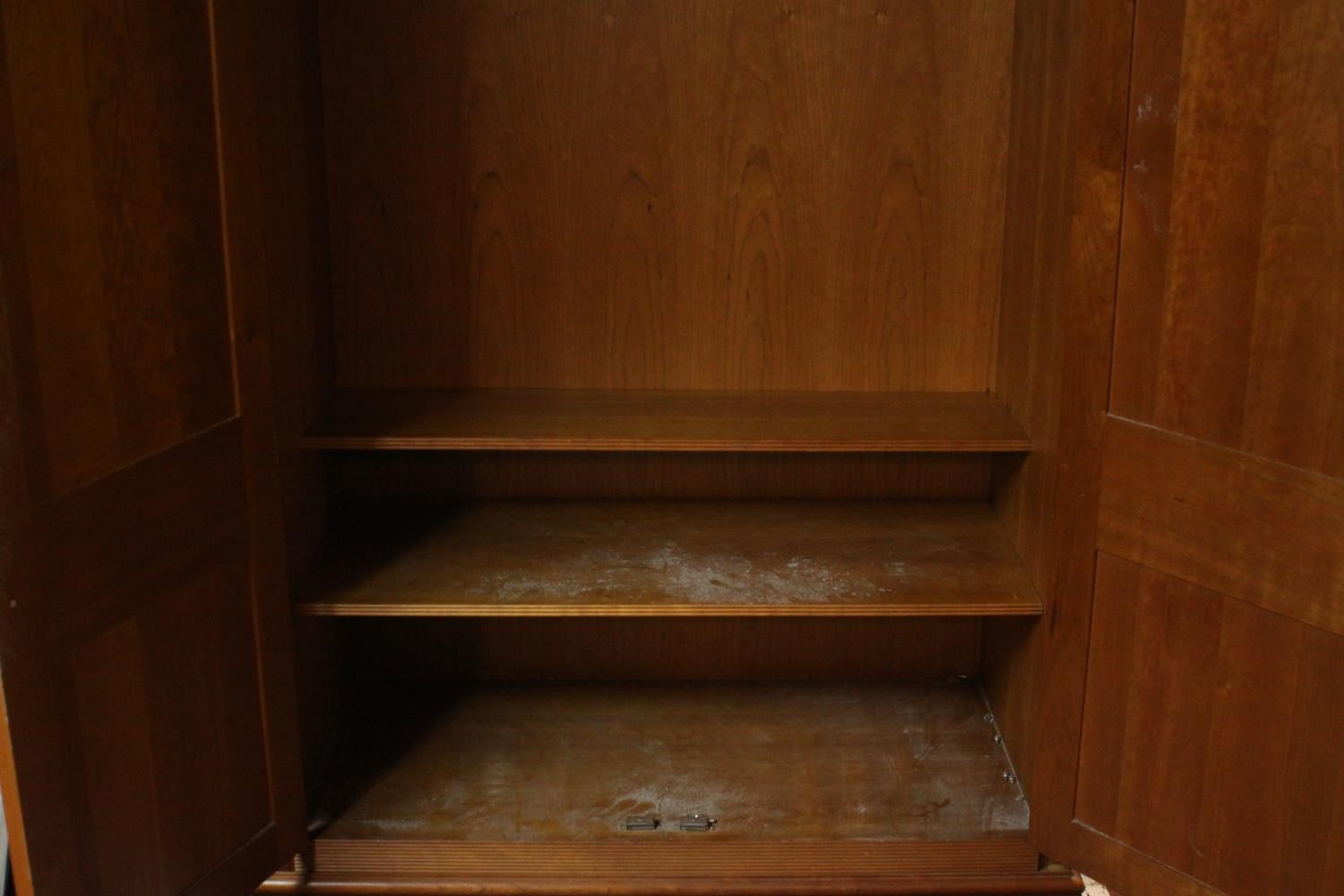 A late 20th century cherrywood wardrobe, with a pair of panelled doors opening to reveal hanging - Image 6 of 13