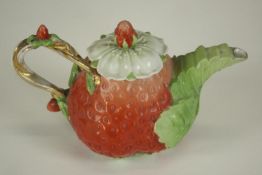 A Royal Bayreuth hand painted porcelain miniature strawberry tea pot with strawberry flower lid. H.
