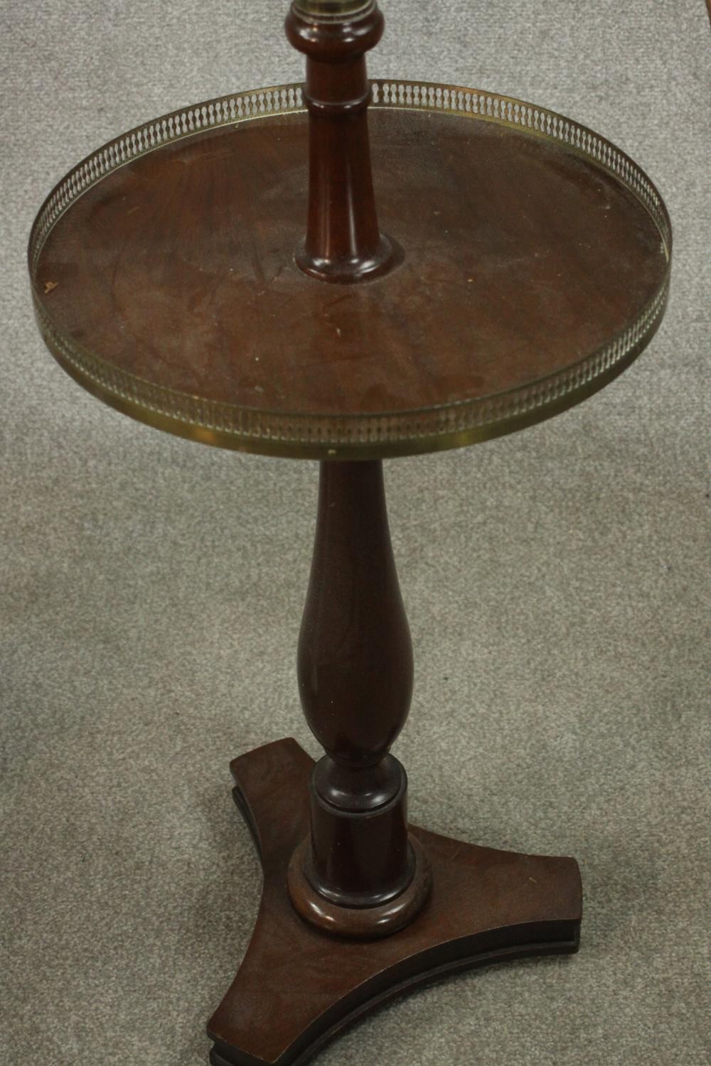 An adjustable standard lamp, with a brass arm and stem, over a circular tier with a pierced brass - Image 5 of 5