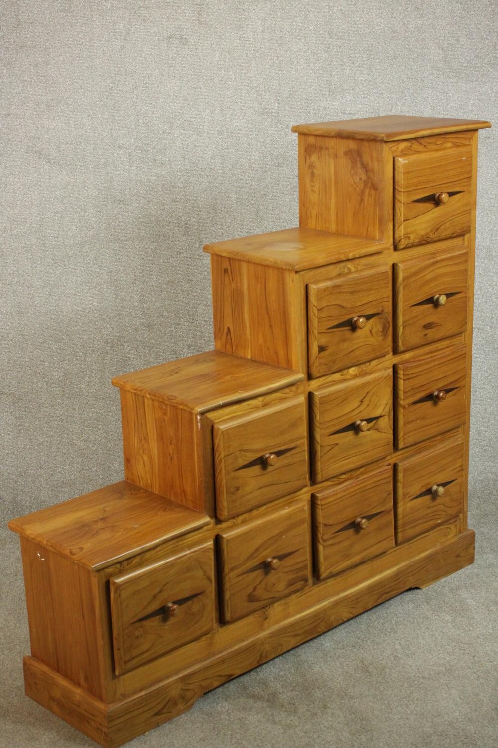 A contemporary pine stepped chest in the style of a Japanese kaidan tansu, with an arrangement of - Image 4 of 9