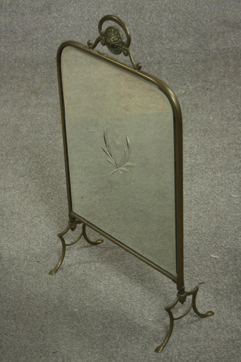 A circa 1900 brass mirrored fire screen, with engraved foliate design to the centre of the mirror - Image 3 of 5