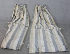 A pair of fully lined heavy striped cream, white ad grey silk/cotton mix curtains, ruched and button