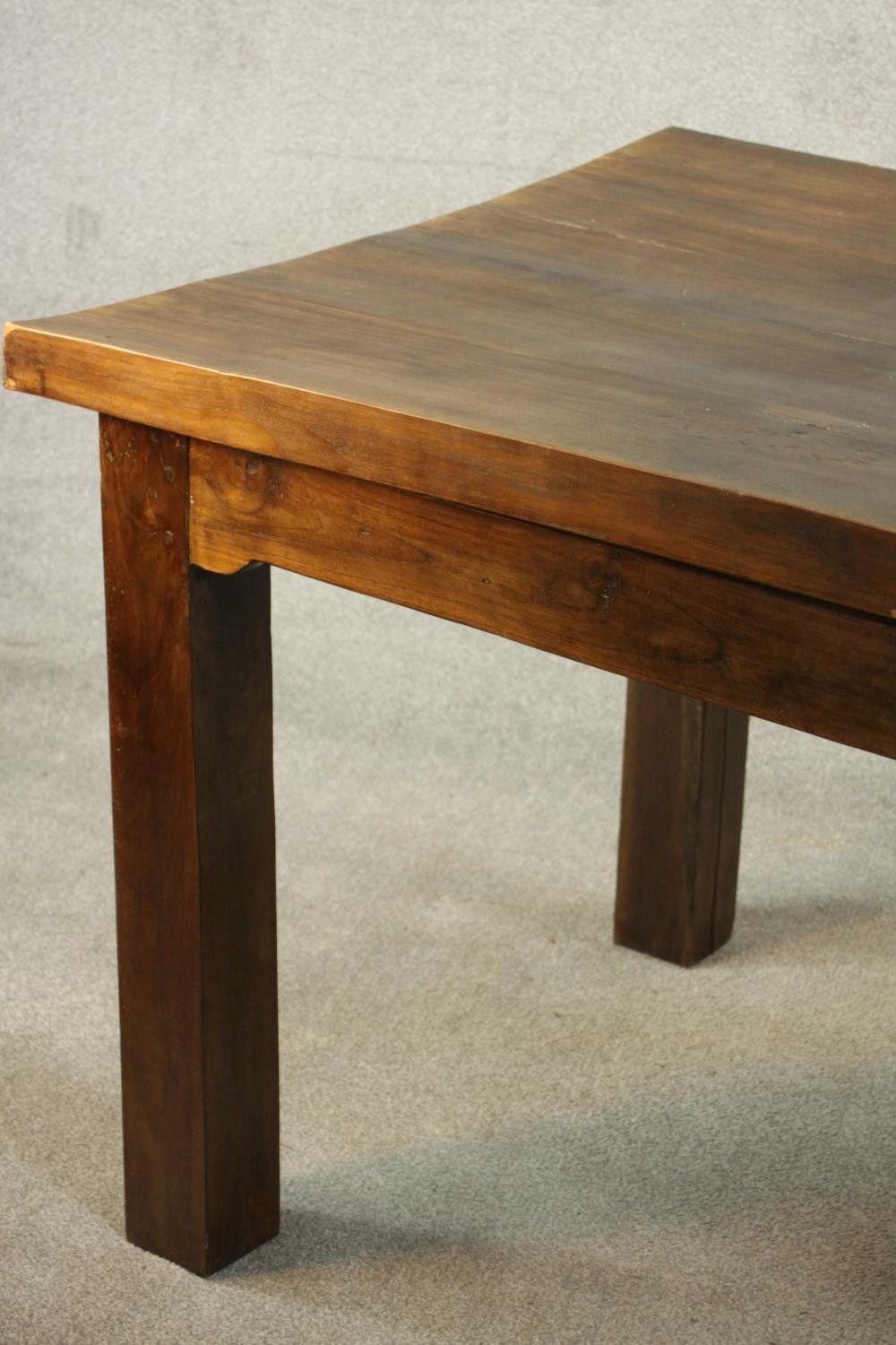 A contemporary hardwood dining table, with a rectangular plank top on square section legs. (badly - Image 5 of 9