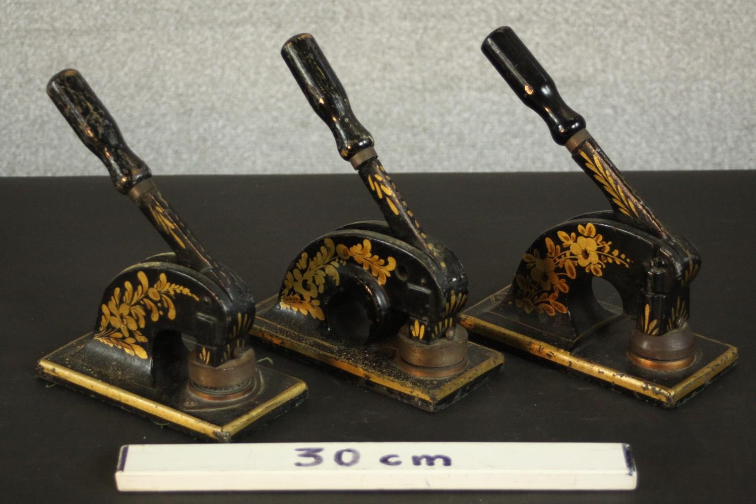 Three Victorian T. H. Marriot gilded iron paper presses, each decorated with a floral and foliate - Image 2 of 6