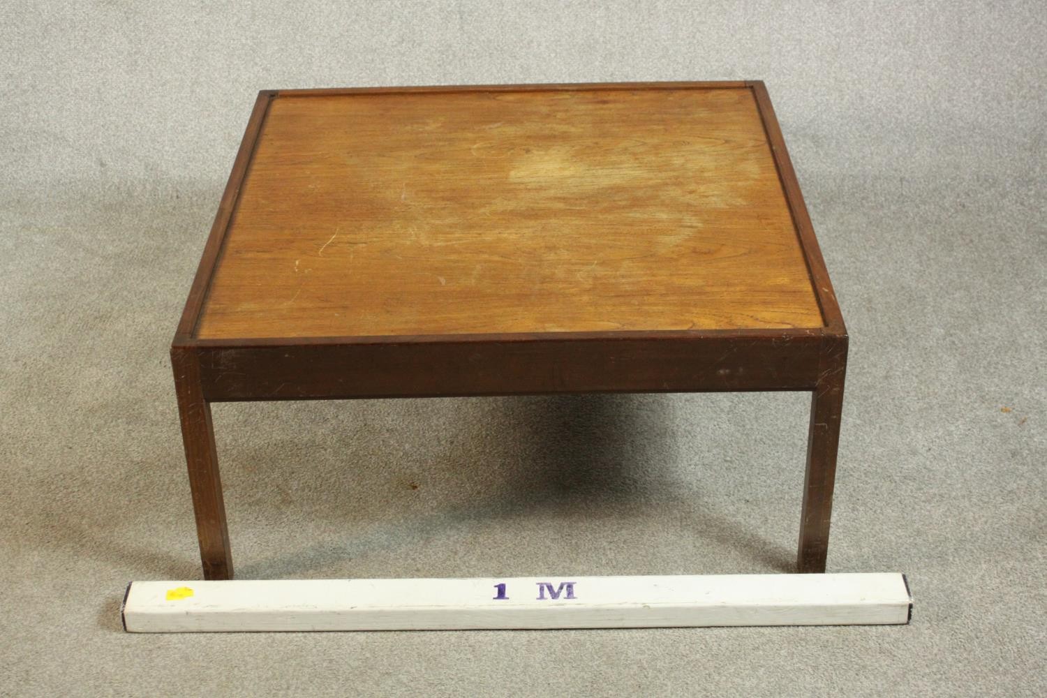 A circa 1960s teak and mahogany coffee table of square form. H.38 W.82cm. - Image 2 of 6