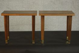 A pair of occasional tables, with a later rectangular top on square section tapering legs with brass