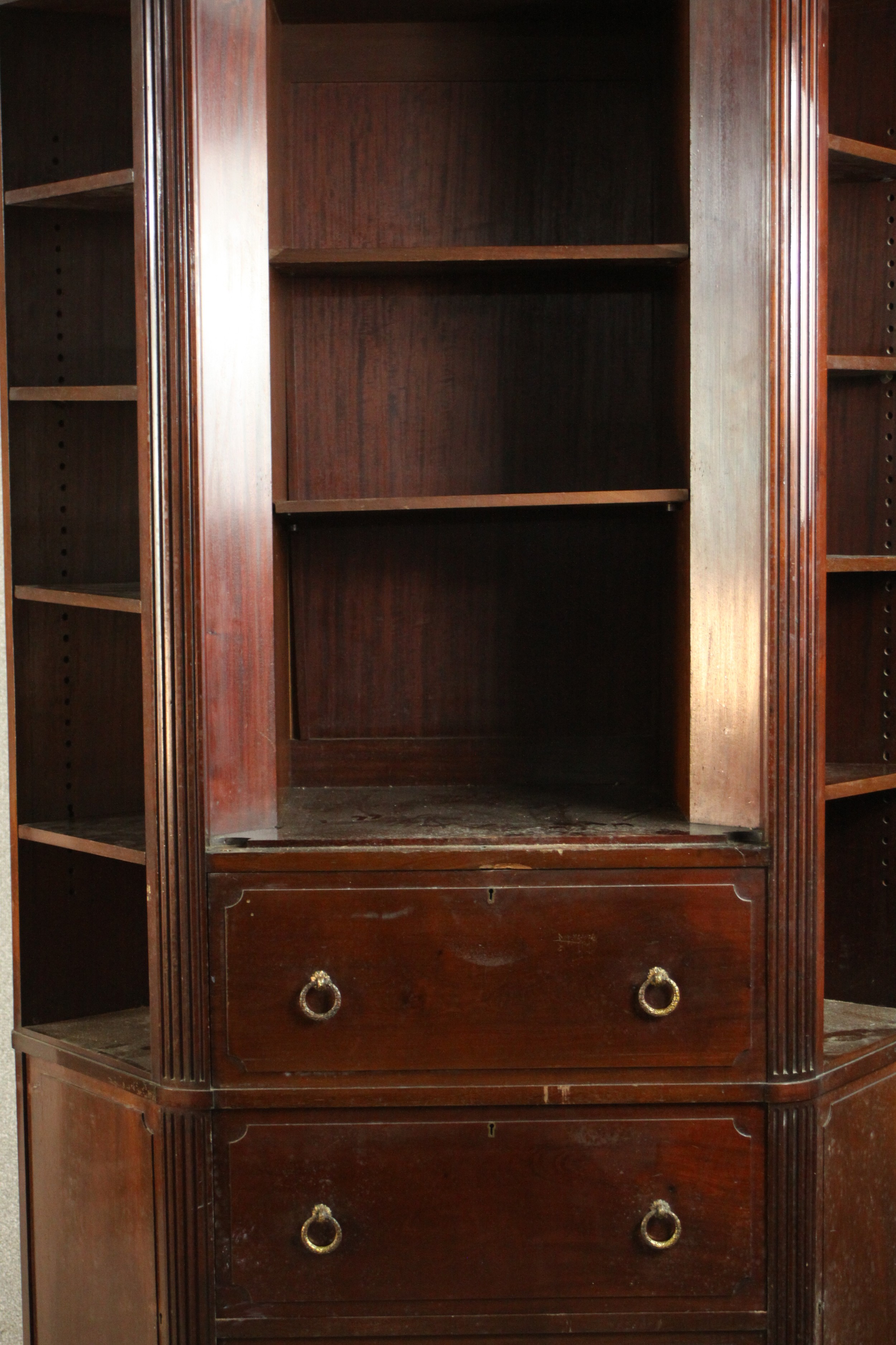 A Continental walnut bookcase with open shelves above drawers on tapering reeded supports. H.210 W. - Image 9 of 9