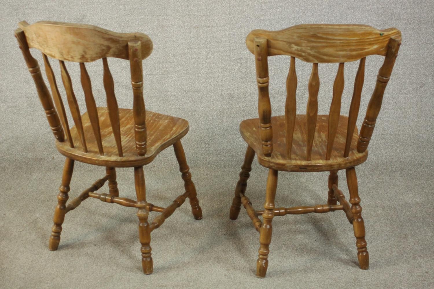 A pair of continental Windsor style plywood and pine kitchen chairs, with carved bar backs, shaped - Image 3 of 7