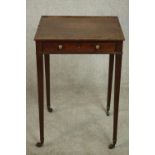 A George III mahogany occasional table, the rectangular top with a shallow three quarter gallery