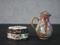 An 18th century Chinese export porcelain covered pitcher decorated with courtiers within a