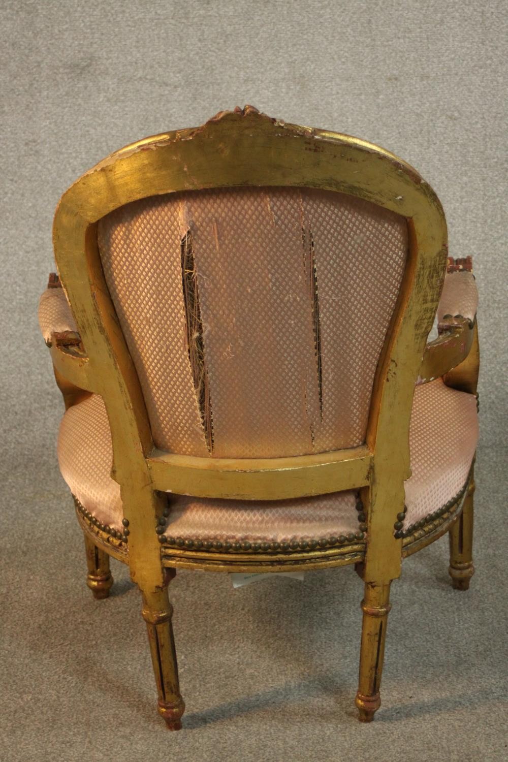 A pair of Louis XVI style giltwood fauteuil armchairs, upholstered in pink fabric to the back, - Image 6 of 12