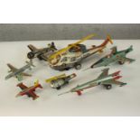 A collection of seven vintage Japanese and Chinese tin plate aircraft. Various makers. H.12 W.38 D.