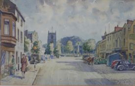 A framed and glazed watercolour of a town street scene, signed D. Binns. H.37 W.50cm