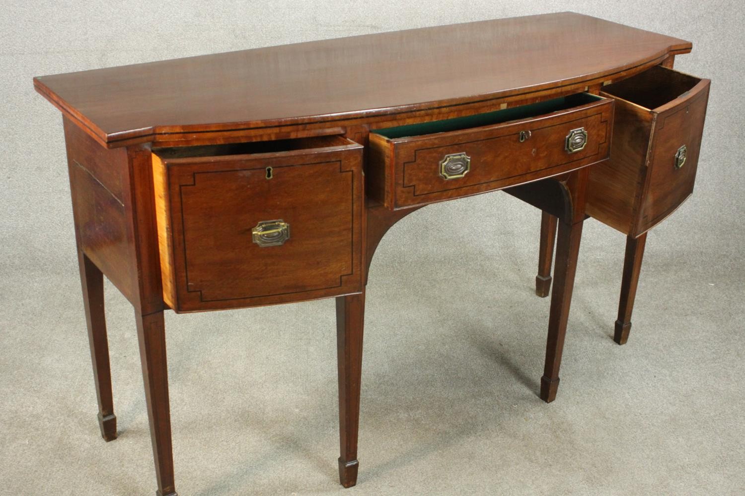 A Regency mahogany bow front sideboard, with a central drawer flanked by two deep drawers on - Image 9 of 13