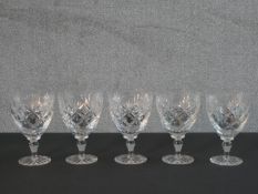 A set of five Webb Corbett cut crystal drinking glasses, stamped to base. H.14 Diam.9cm