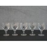 A set of five Webb Corbett cut crystal drinking glasses, stamped to base. H.14 Diam.9cm