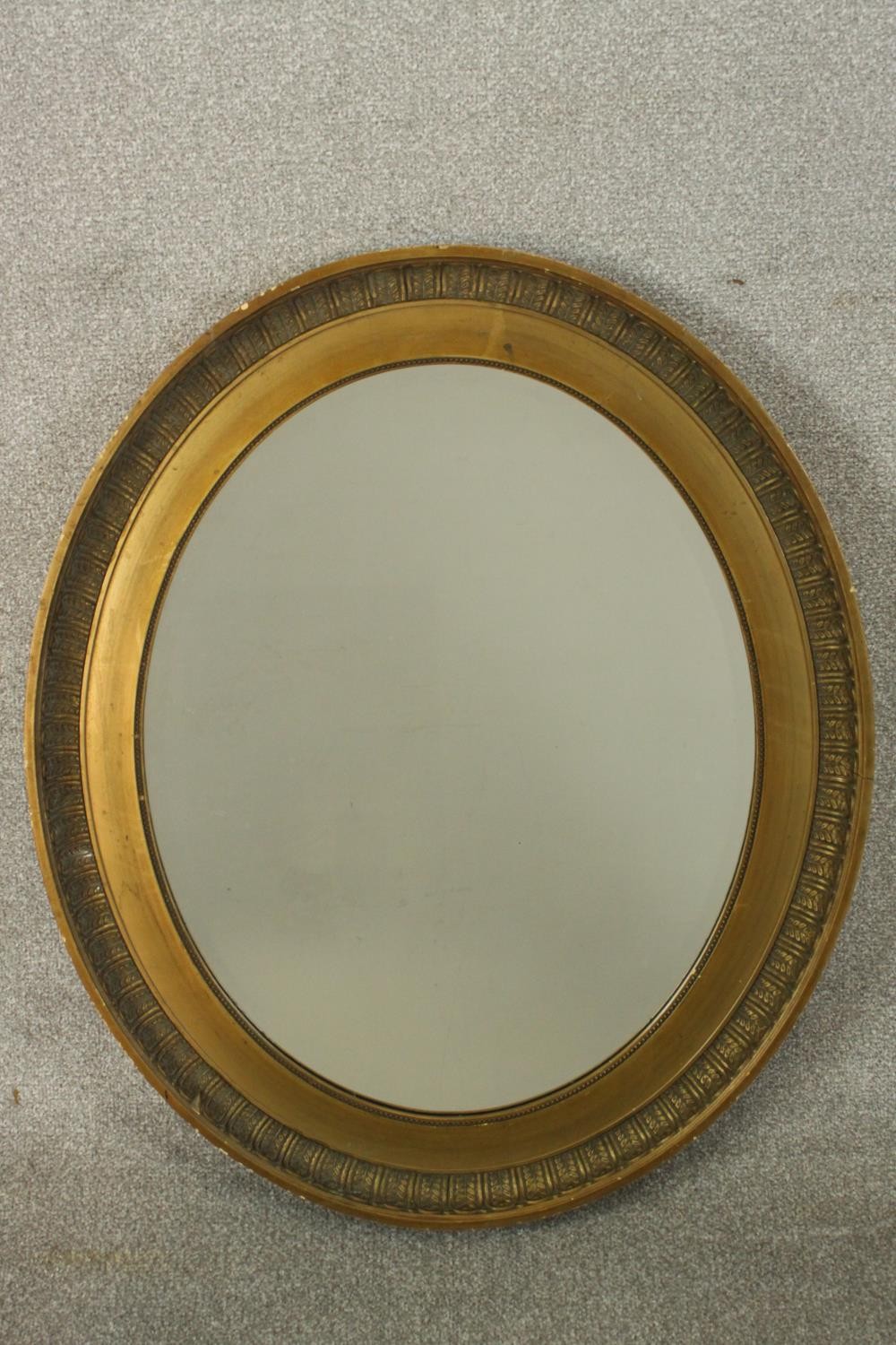 An early 20th century oval gilt mirror, with a bevelled mirror plate, together with a mahogany - Image 3 of 7