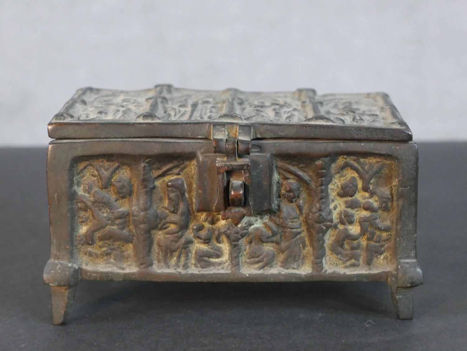 A bronze casket with relief religious figural design on four feet along with a silver plated Roman - Image 4 of 7