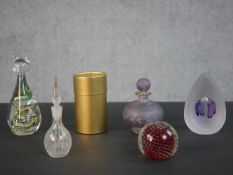A collection of glass, including a boxed Isle of Wight art glass cup, a cat paperweight, a signed