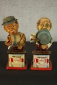 A pair of Japanese tinplate toy Charlie Weaver bartenders, by Rosko Toys, mixing cocktails, the