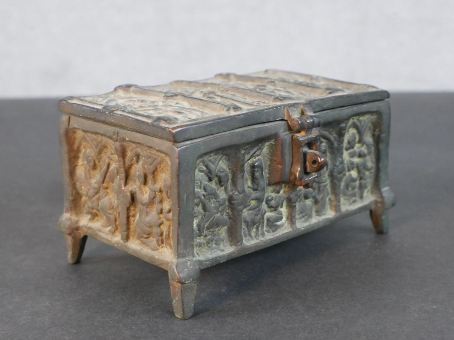 A bronze casket with relief religious figural design on four feet along with a silver plated Roman - Image 5 of 7