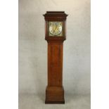 A 19th century oak longcase clock, eight day movement, the silvered chapter ring with Roman and